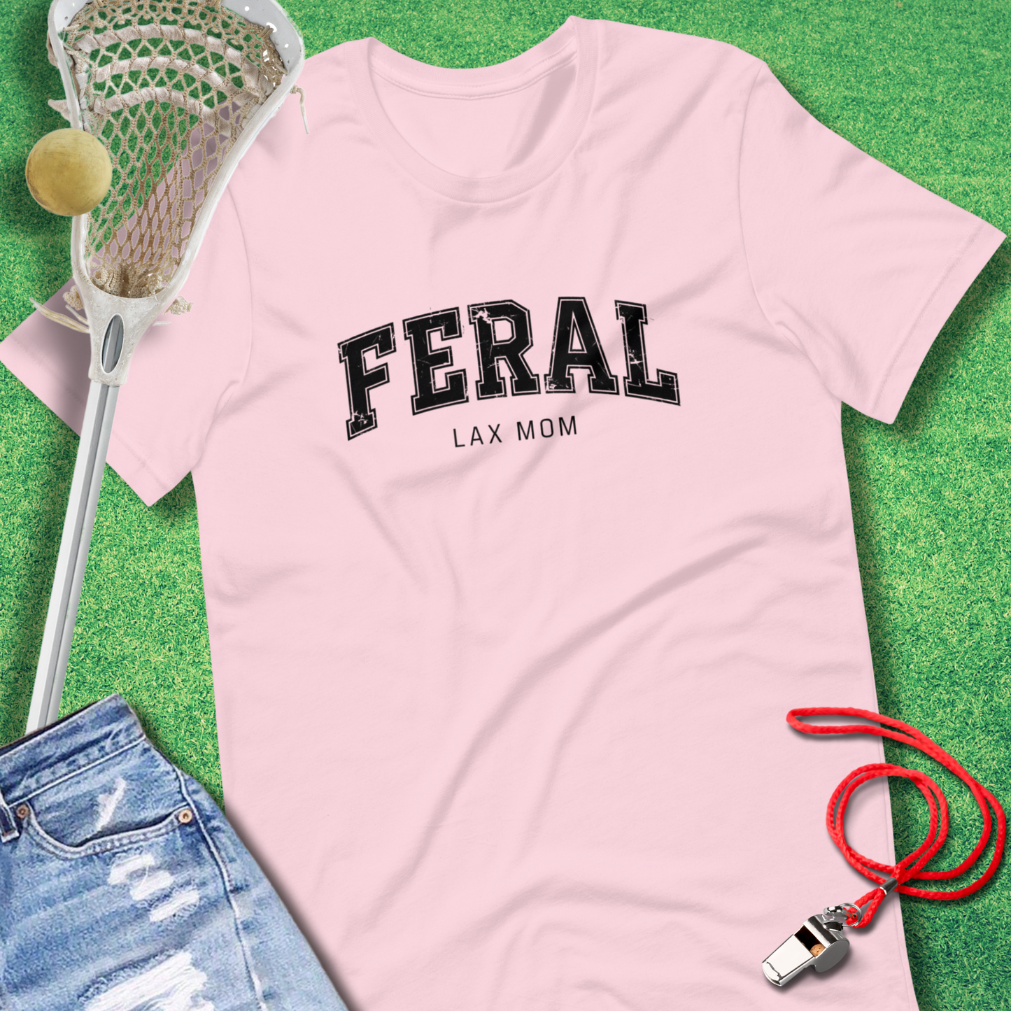 Feral Lax Mom T-shirt styled for sports parents cheering at lacrosse games pink tee