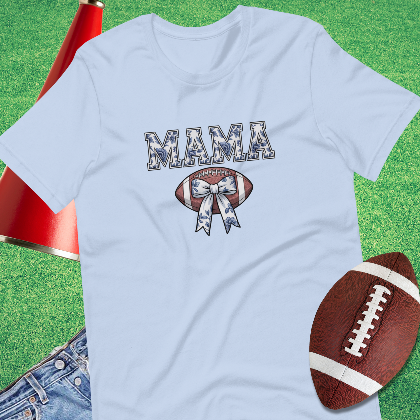 Close-up of chinoiserie floral Mama design with bow and football on sports mom tee