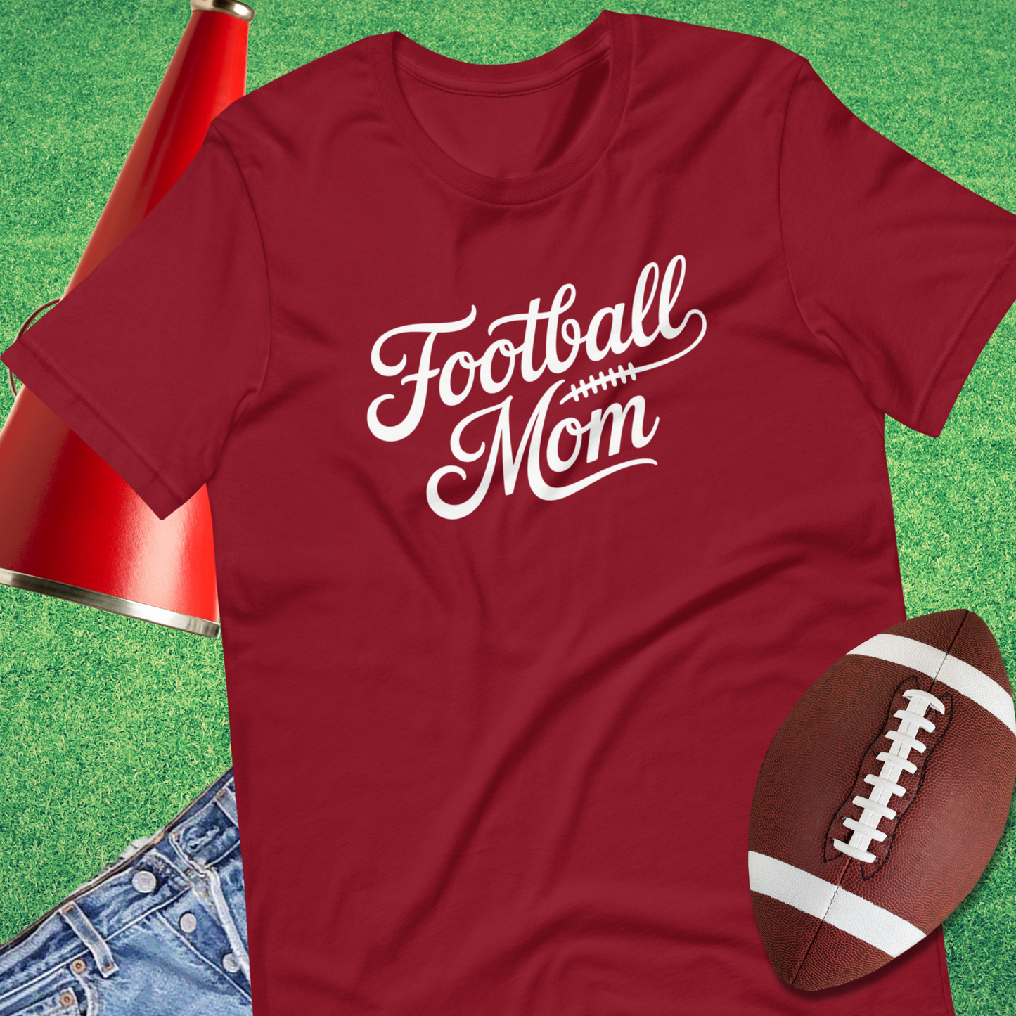 Close-up of classic script football mom design on graphic tee red t-shirt game day