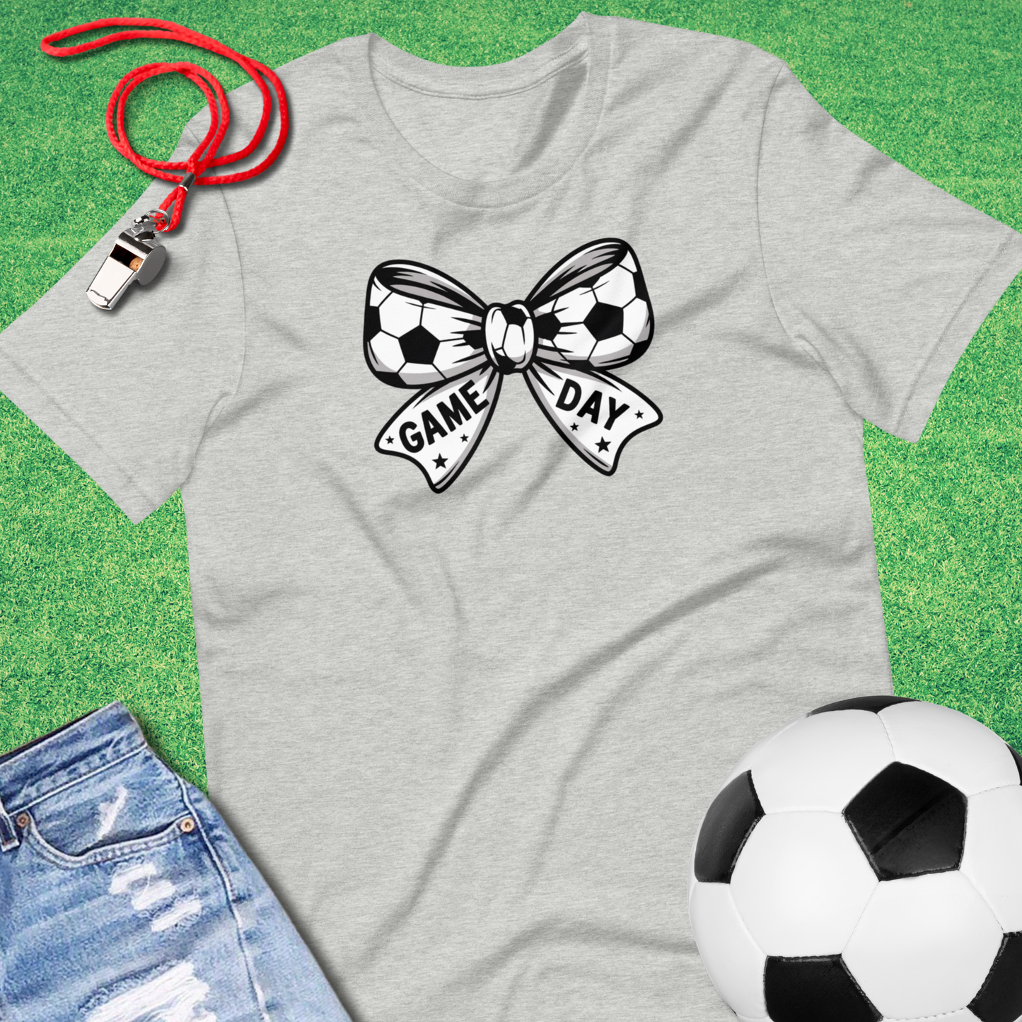 Trendy soccer graphic tee for girls featuring a soccer ball bow design