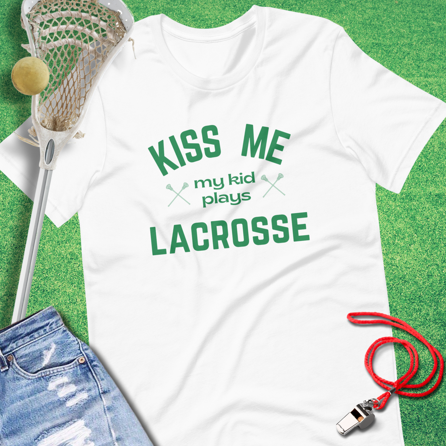 Kiss Me, My Kid Plays Lacrosse T-Shirt in White - Shamrock Lax Apparel for Players and Fans | Sideline Gods