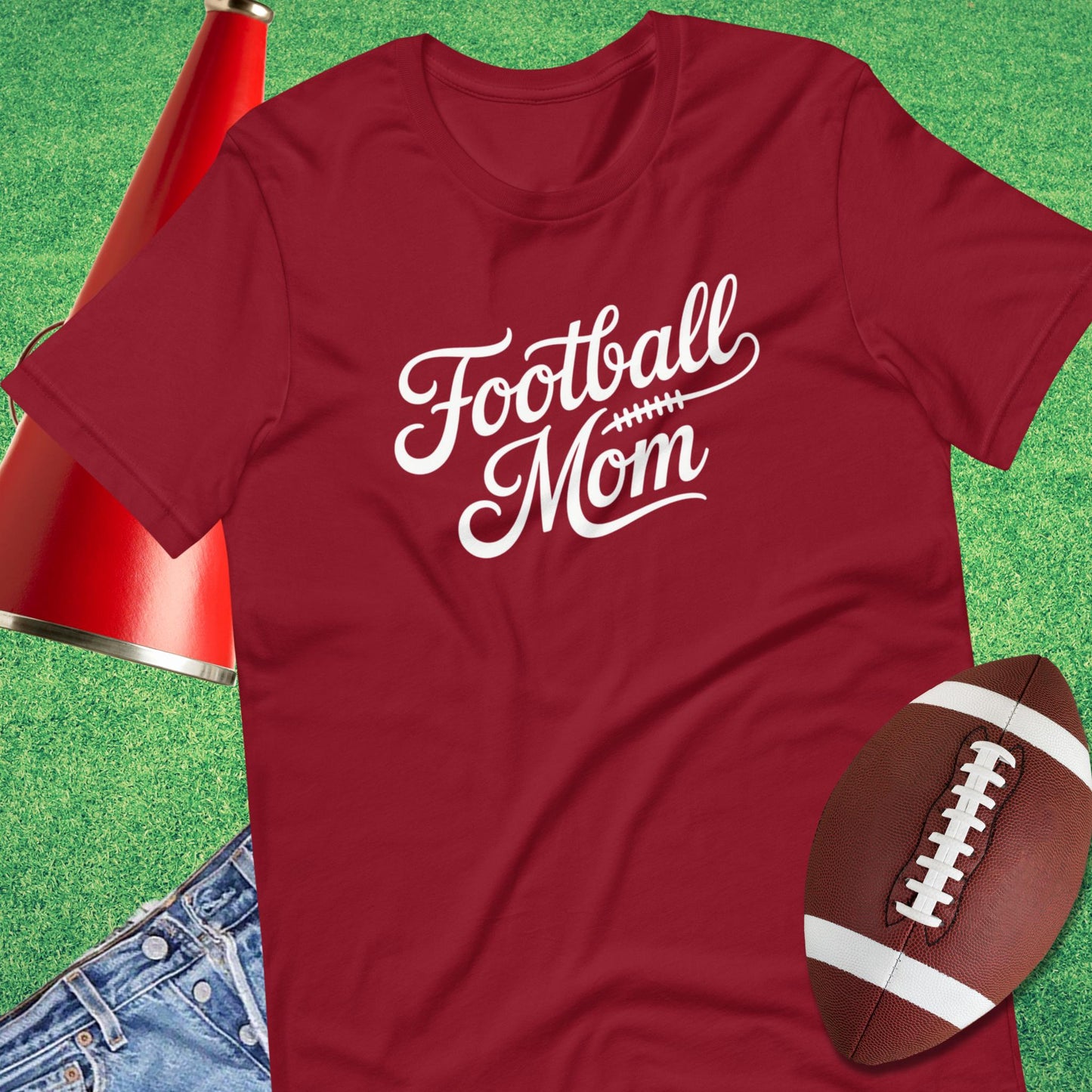 Close-up of classic script football mom design on graphic tee red t-shirt game day