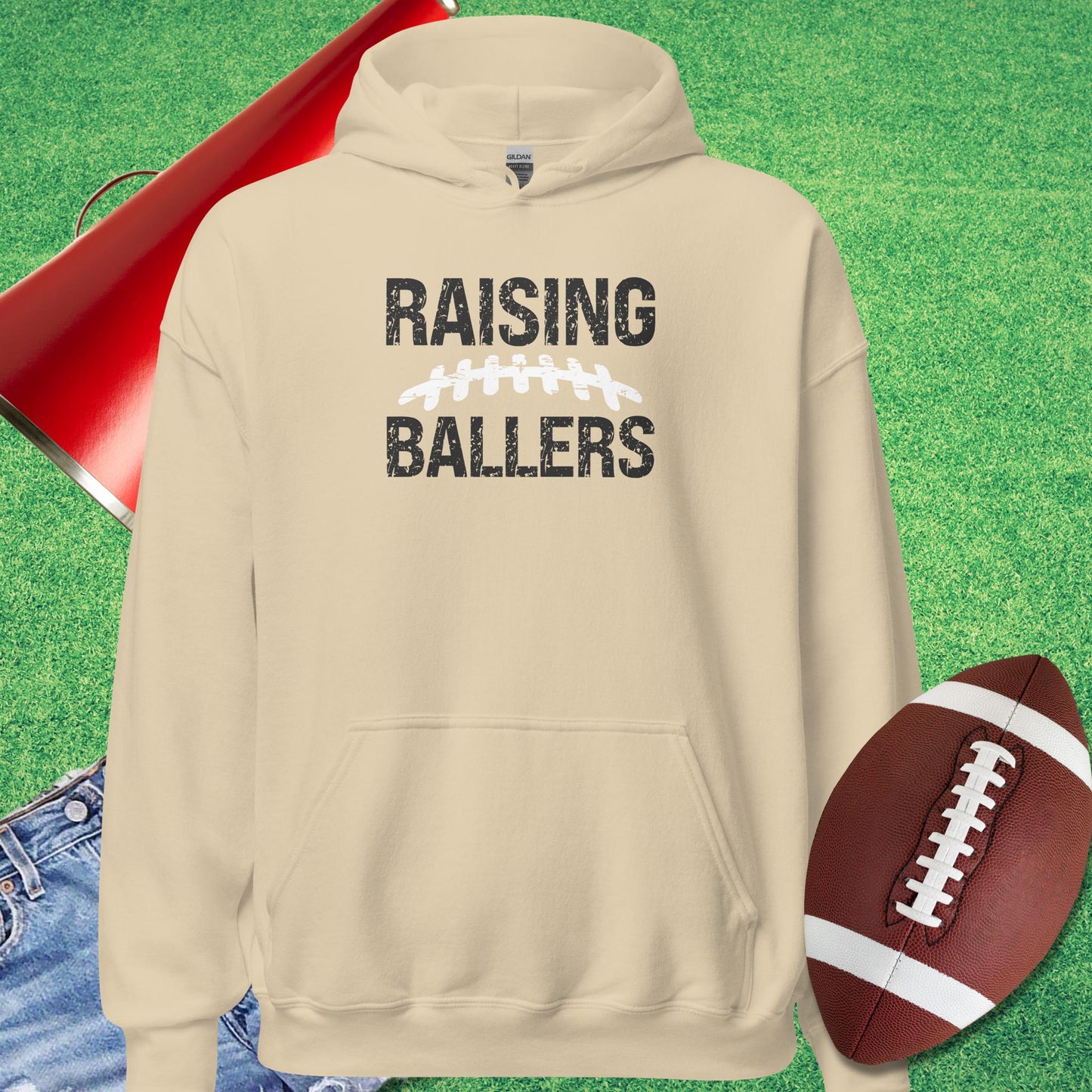 Raising Footballers Hoodie in Sand Funny Parent Hoodie - Sideline Gods