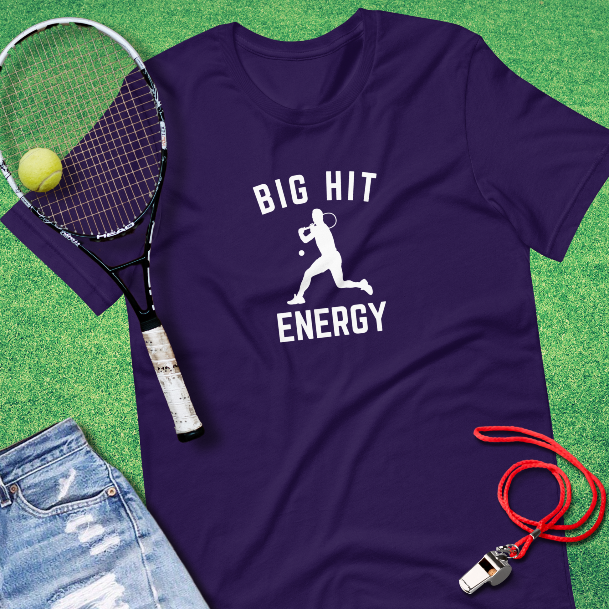Flat lay of Sideline Gods tennis graphic tee with racket and tennis balls purple gift tennis fan 