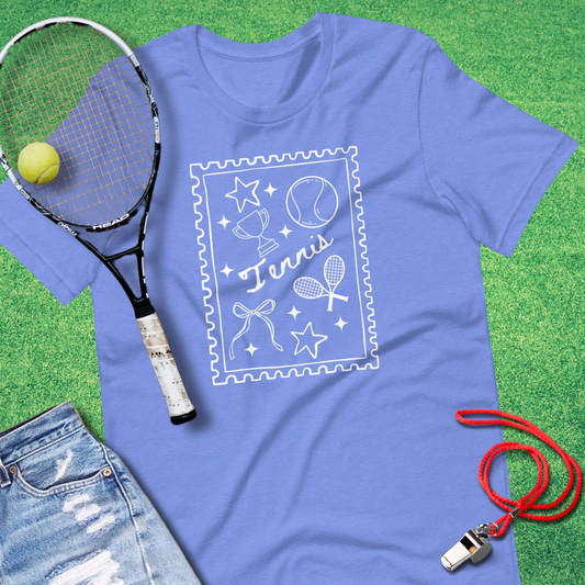 Flat lay of Sideline Gods tennis doodle graphic shirt with rackets and tennis balls blue tennis mom
