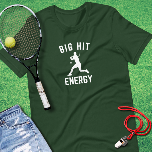 Flat lay of Sideline Gods tennis graphic tee with racket and tennis balls.