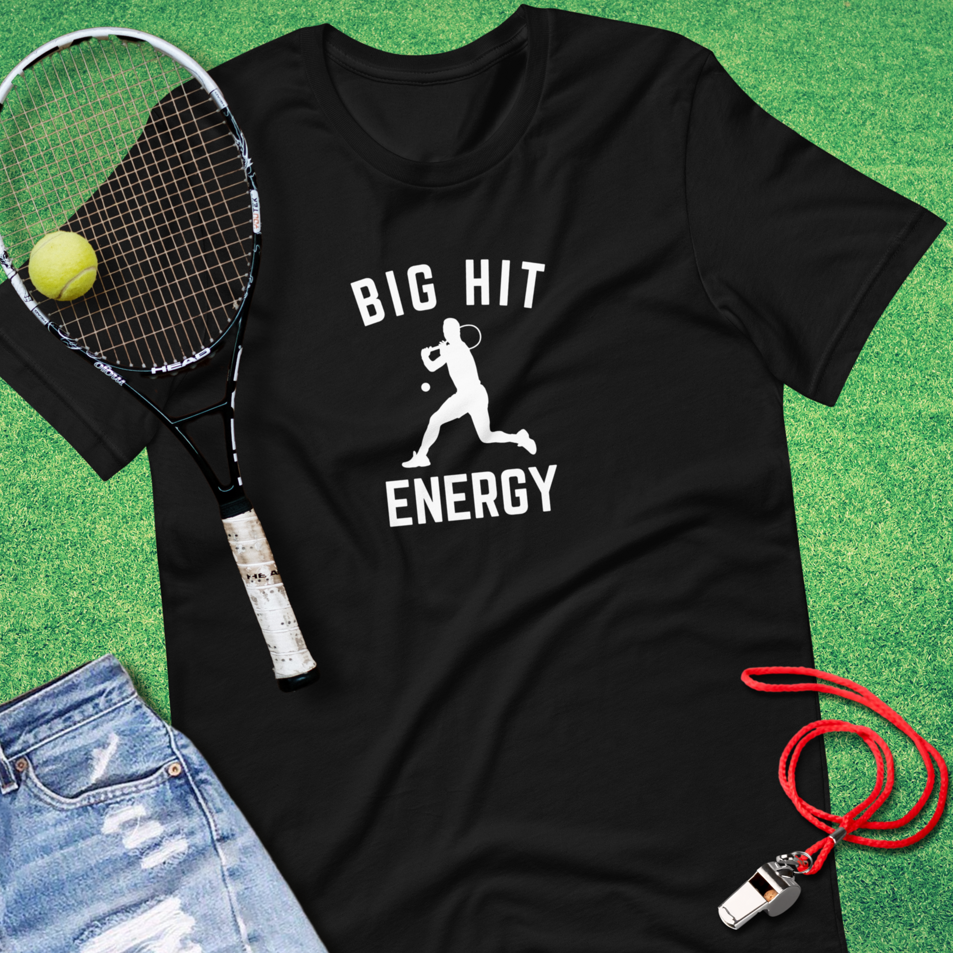 Close-up of Big Hit Energy tennis design on black graphic tee.